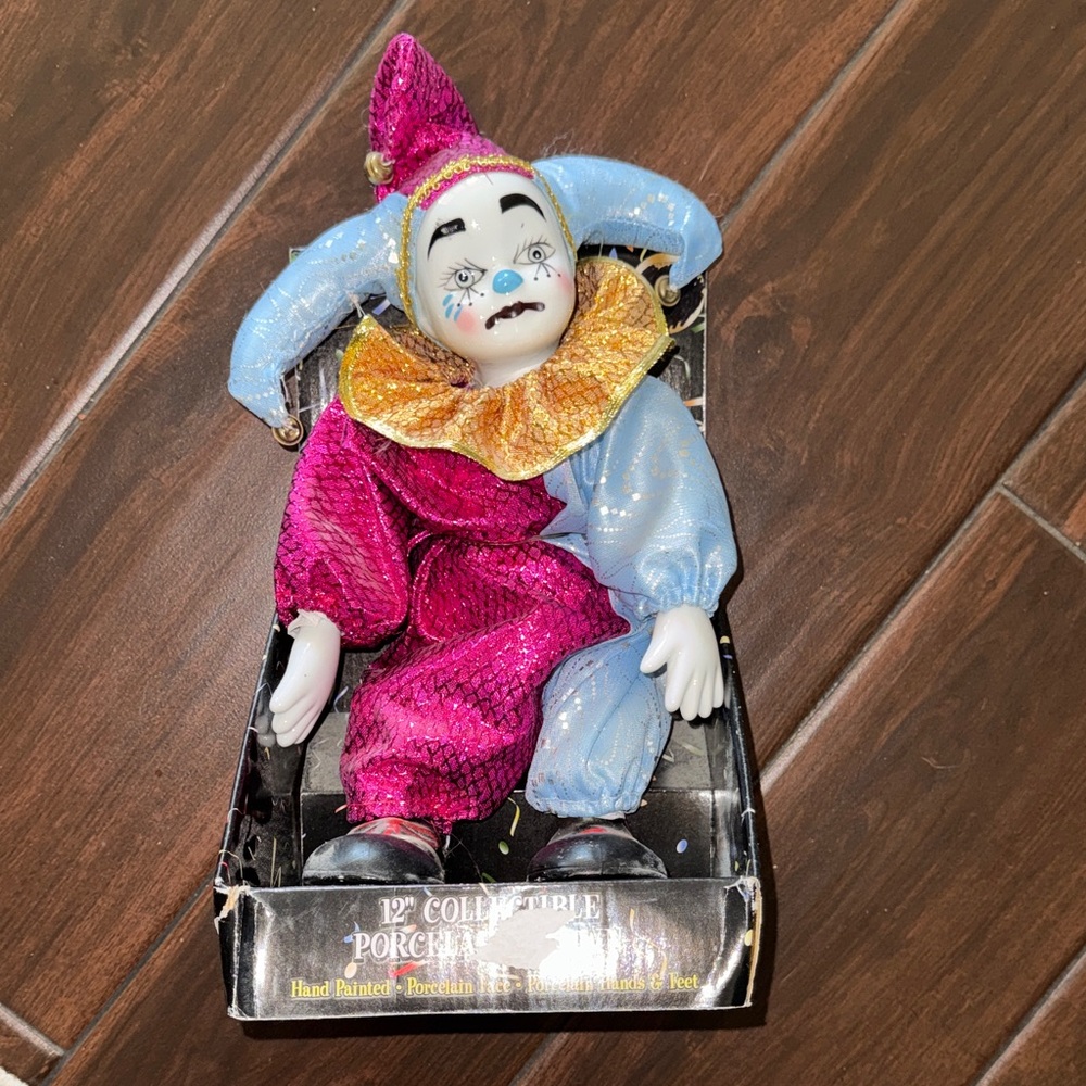 Porcelain Clown Doll with Pink and Blue Outfit
